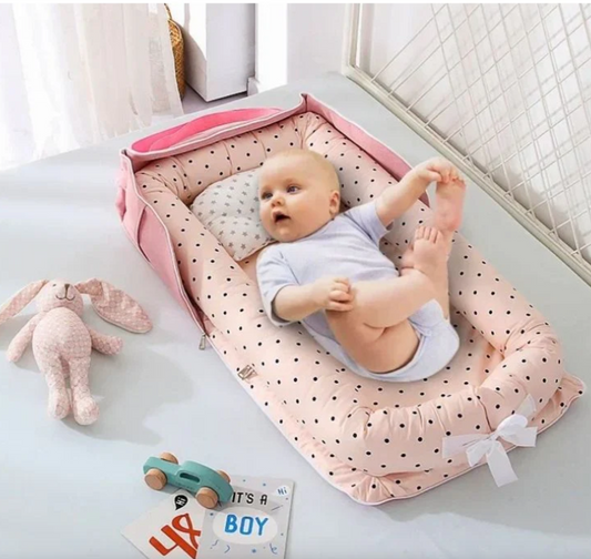Reducteur de lit bebe - Nid2Go™