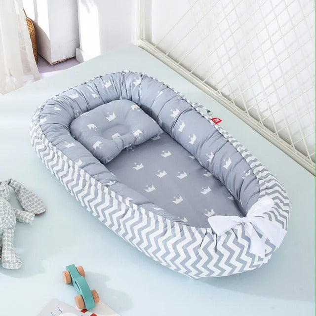 Reducteur de lit bebe - BabyNesty™