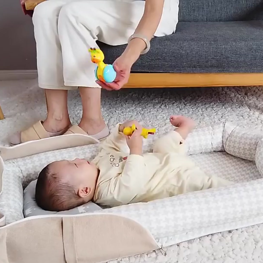 Reducteur de lit bebe - Nid2Go™